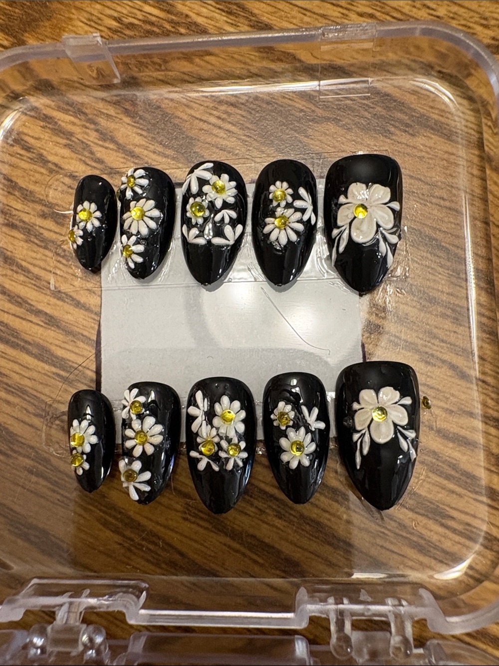 Black Floral Press-On Nails with White Daisies and Gold Accents